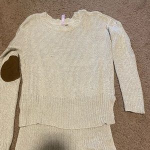 Francesca’s sweater with patches on elbows